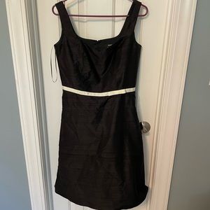 Black express dress size 7/8. Never worn. Great for weddings or cocktail event.